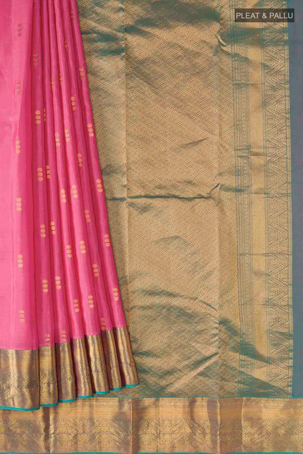 Pleats and pallu of Pink Kanchipuram Silk Saree with Zari Butta on the body and Zari Border