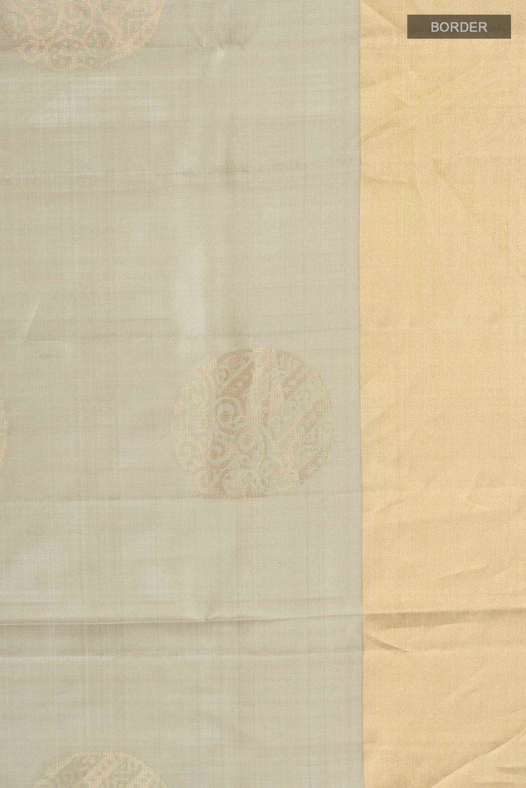Border image of Green Soft Silk Saree with Zari Butta on the body and Zari Border