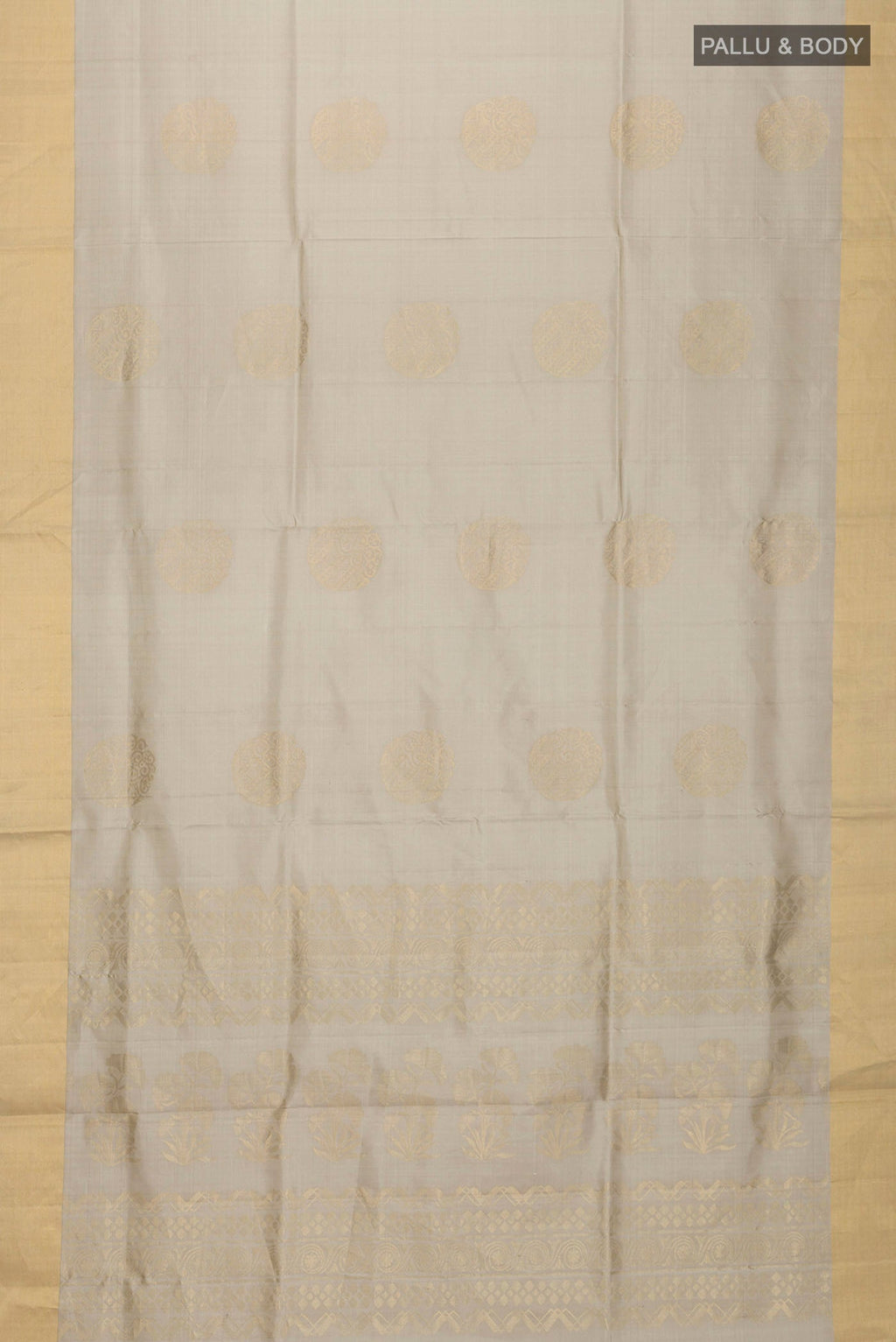 Flat view of Green Soft Silk Saree with Zari Butta on the body and Zari Border