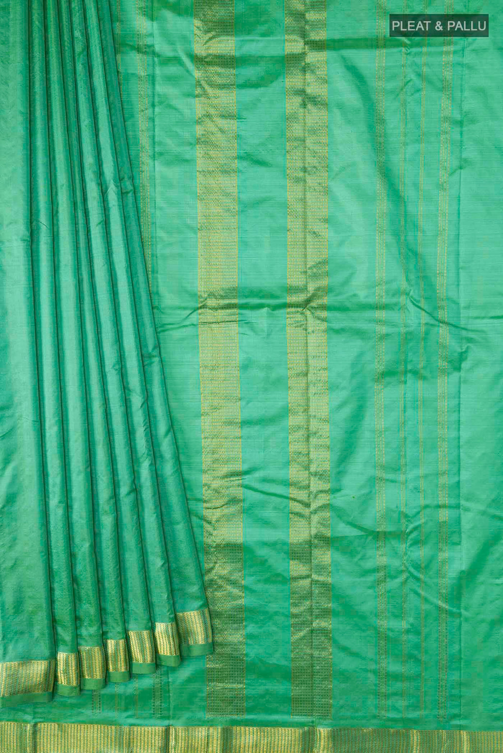 Pleats and pallu of Green Kanchipuram Silk Saree with Plain Body and Zari Border