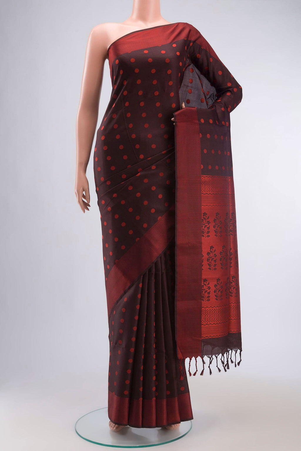 Brown Soft Silk Saree with Thread Butta on the body and Thread Border displayed on a mannequin