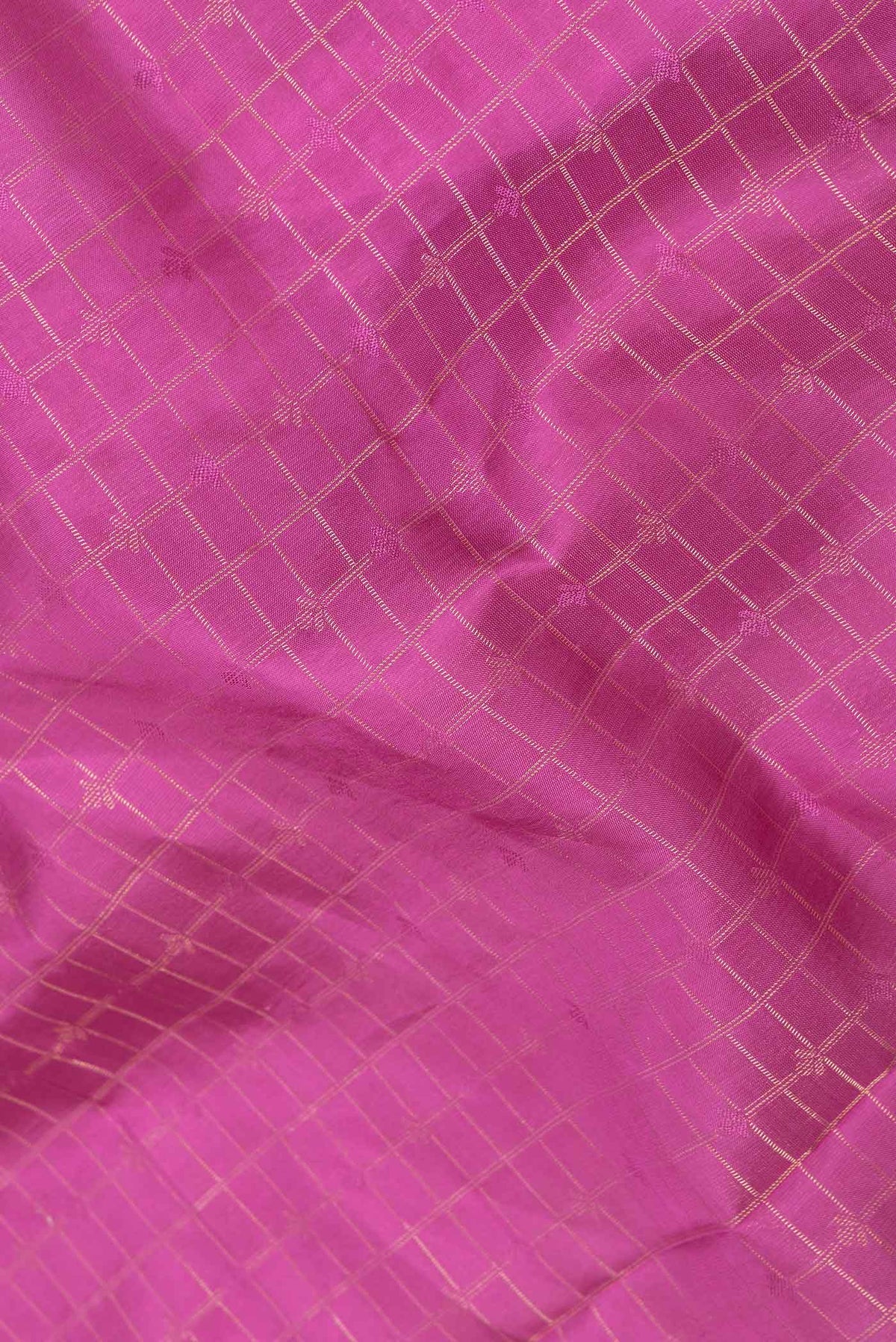 Close up of Pink Dual Tone Soft Silk Saree with Zari Brocade on the body and Zari Border displaying folds