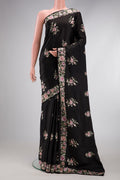 Black Dual Tone Crepe Saree with Embroidery on the body and Embroidery Border.  displayed on a mannequin