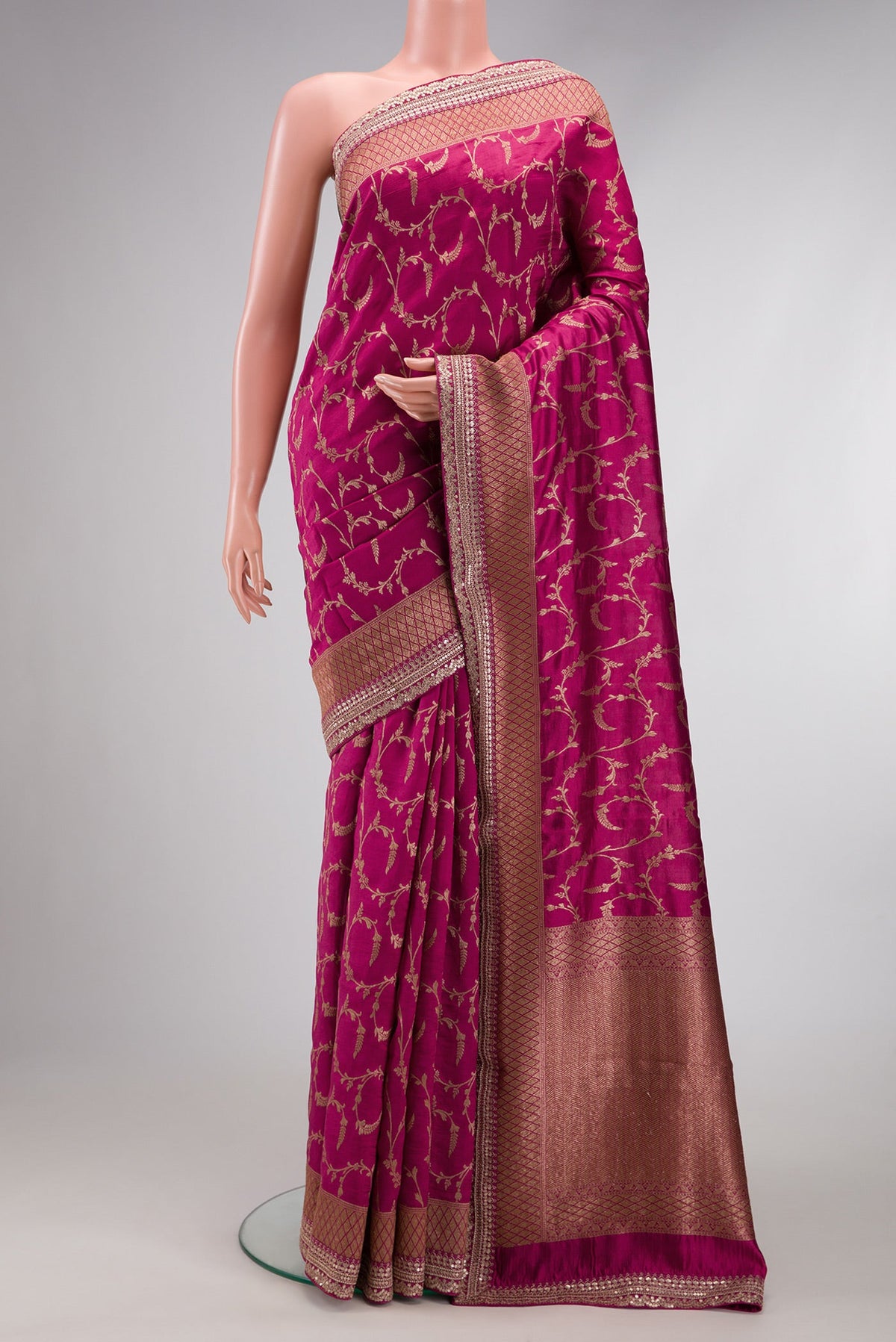 Magenta Dual Tone Tussar Silk Saree with Zari Brocade on the body and Fancy Border.  displayed on a mannequin