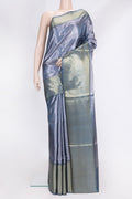 Peacock Blue Dual Tone Tussar Silk Saree with Thread Butta on the body and Zari Border.  displayed on a mannequin