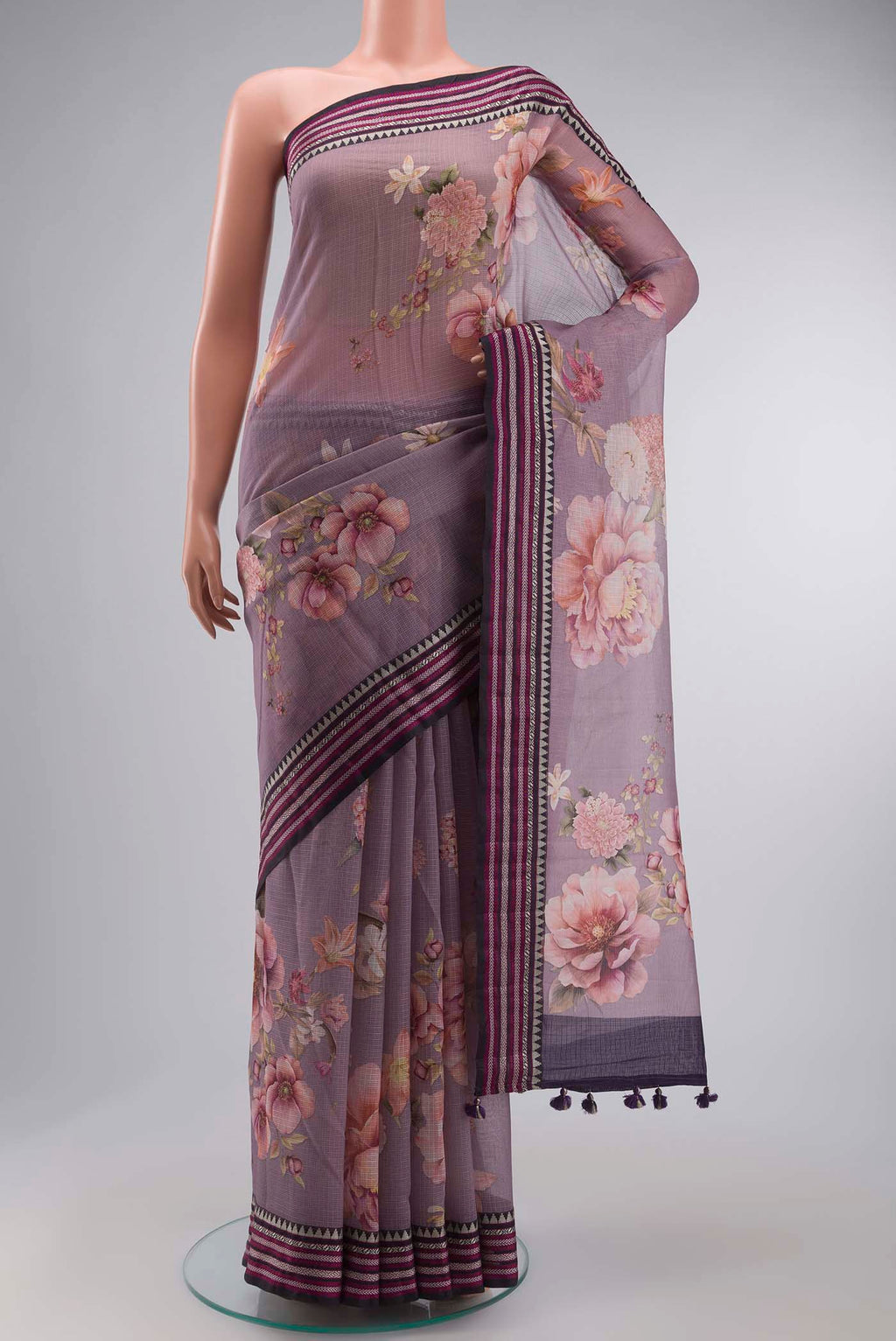 Lavender Kota Cotton Saree with Printed design on the body and Thread Border displayed on a mannequin