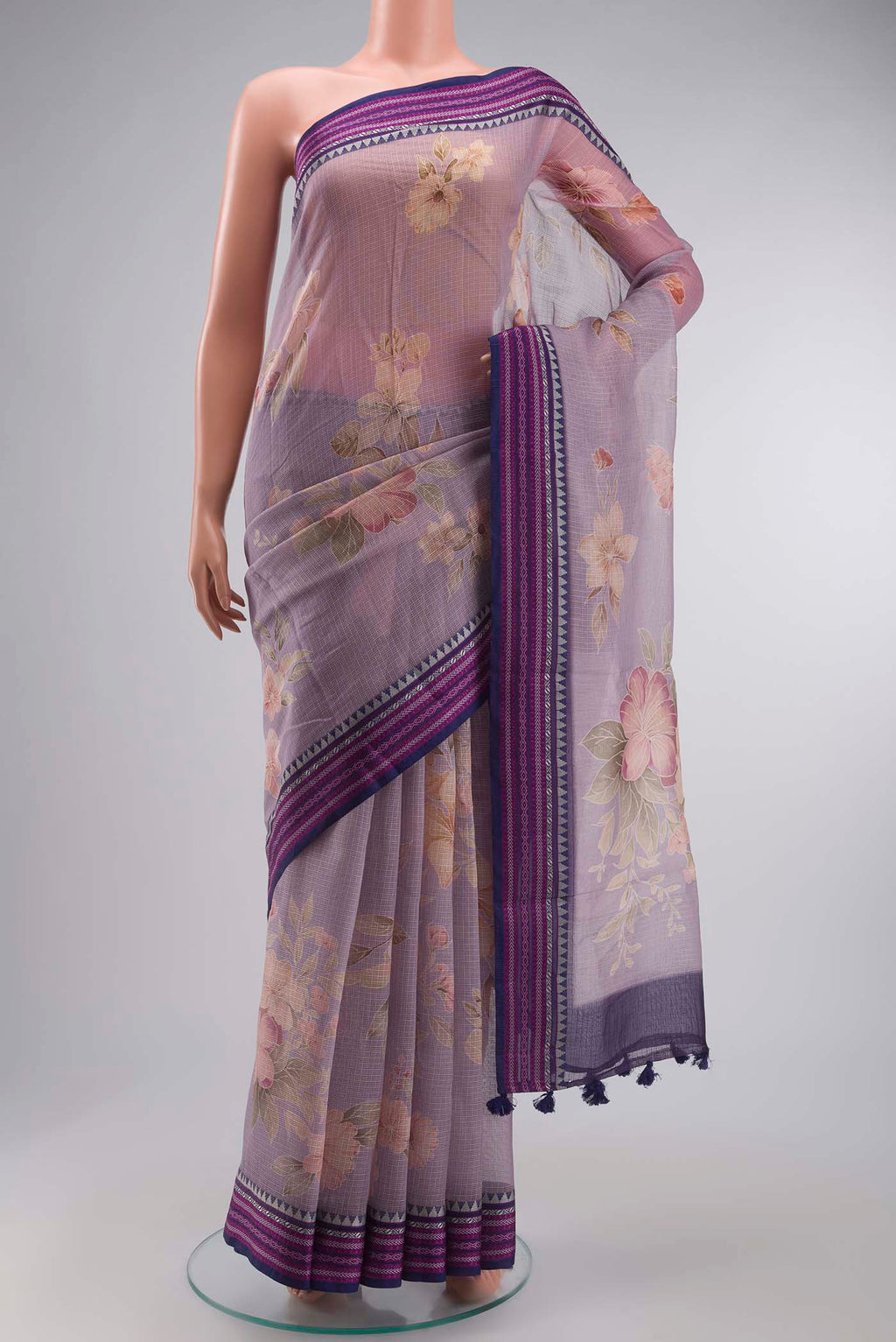Lavender Kota Cotton Saree with Printed design on the body and Thread Border displayed on a mannequin