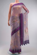 Lavender Kota Cotton Saree with Printed design on the body and Thread Border displayed on a mannequin