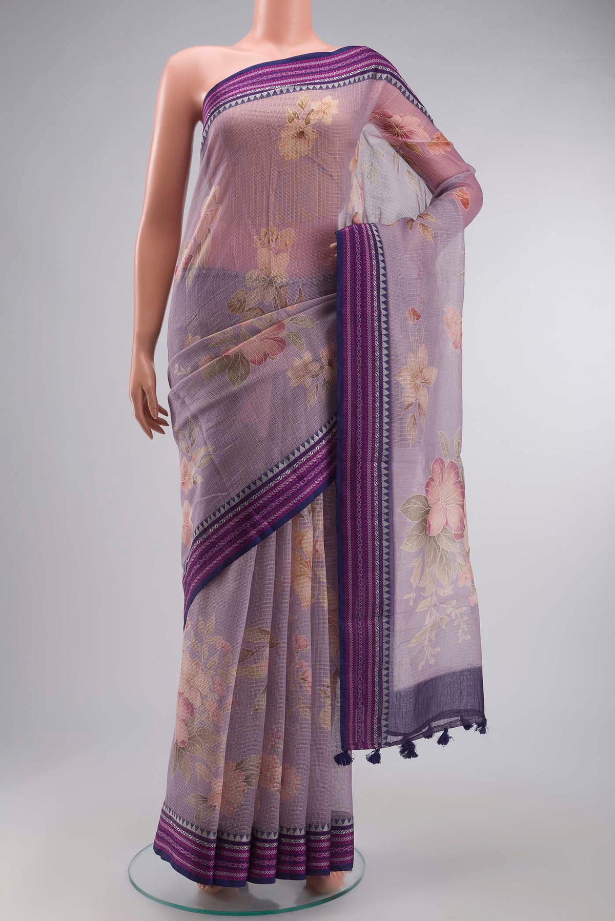 Lavender Kota Cotton Saree with Printed design on the body and Thread Border displayed on a mannequin