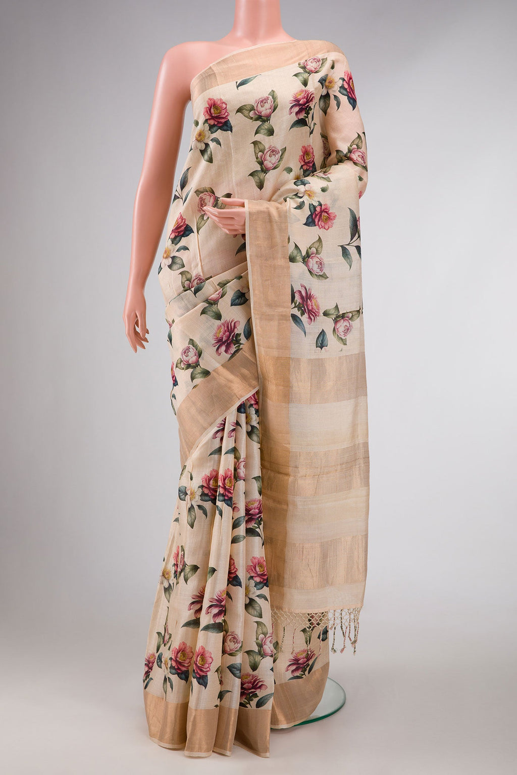 Sandal Tussar Silk Saree with Floral Print on the body and Zari Border displayed on a mannequin