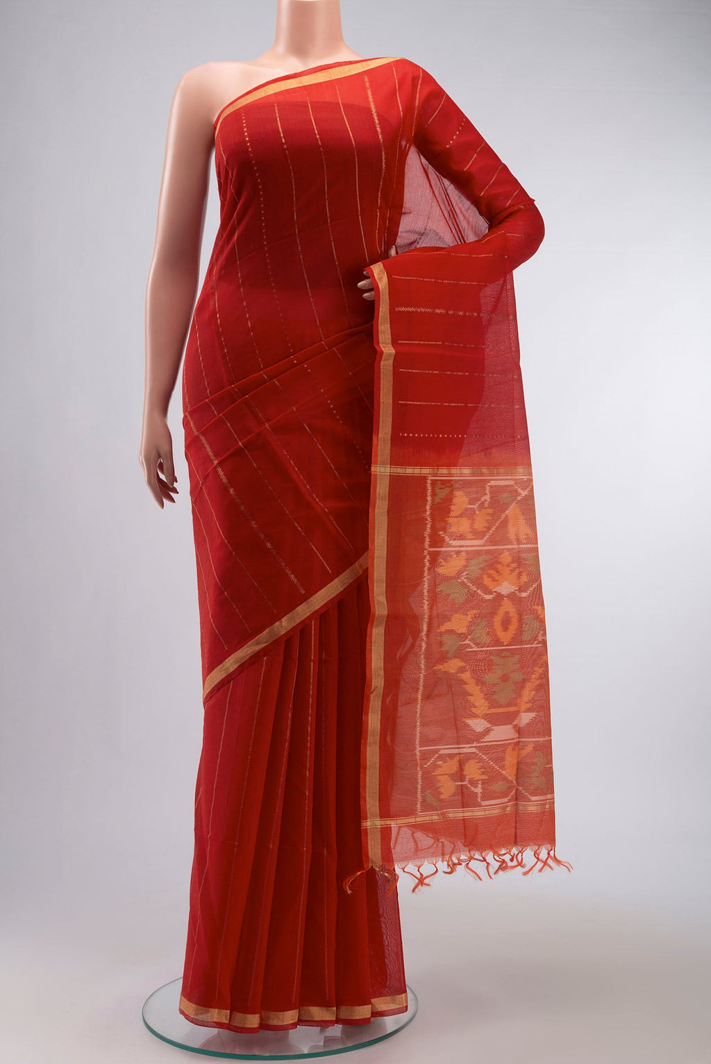 Red Silk Cotton Saree with Stripes on the body and Zari Border displayed on a mannequin