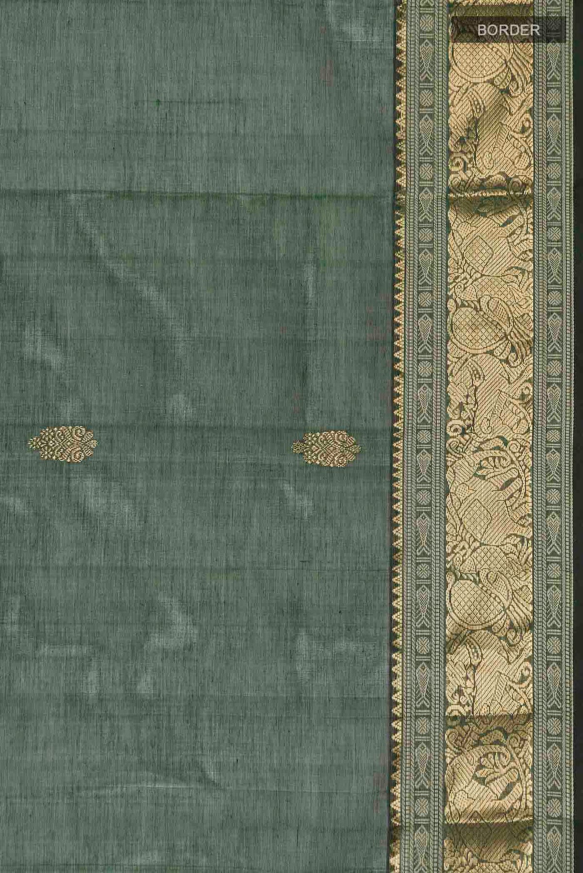 Border image of Green Silk Cotton Saree with Zari Butta on the body and Zari Border