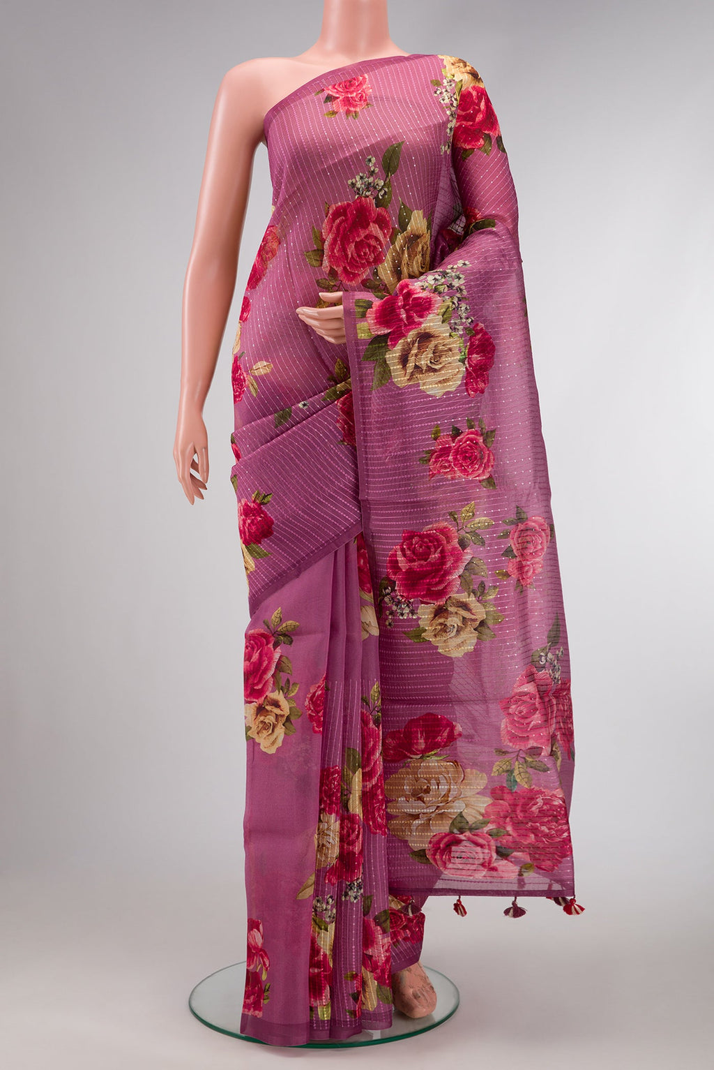 Burgundy Dual Tone Organza Silk Saree with Printed design on the body and Without Border.  displayed on a mannequin