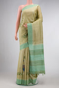 Pista Green Dual Tone Tussar Silk Saree with Printed design on the body and Plain Border.  displayed on a mannequin