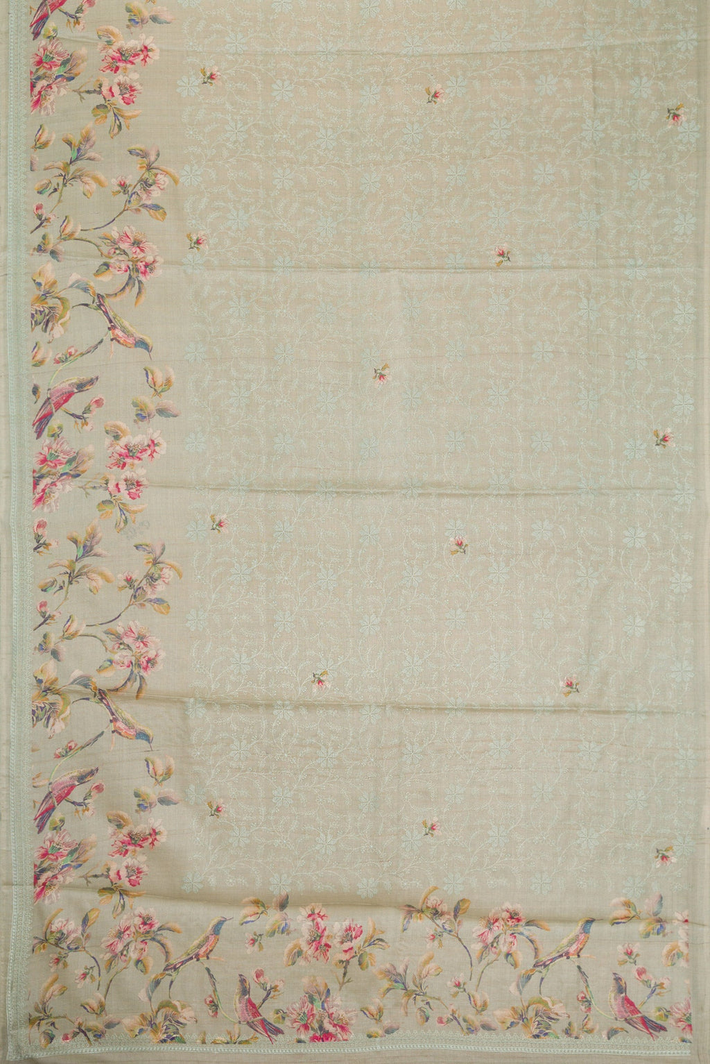 Flat view of Grey Dual Tone Tussar Silk Saree with Printed design on the body and Embroidery Border. 