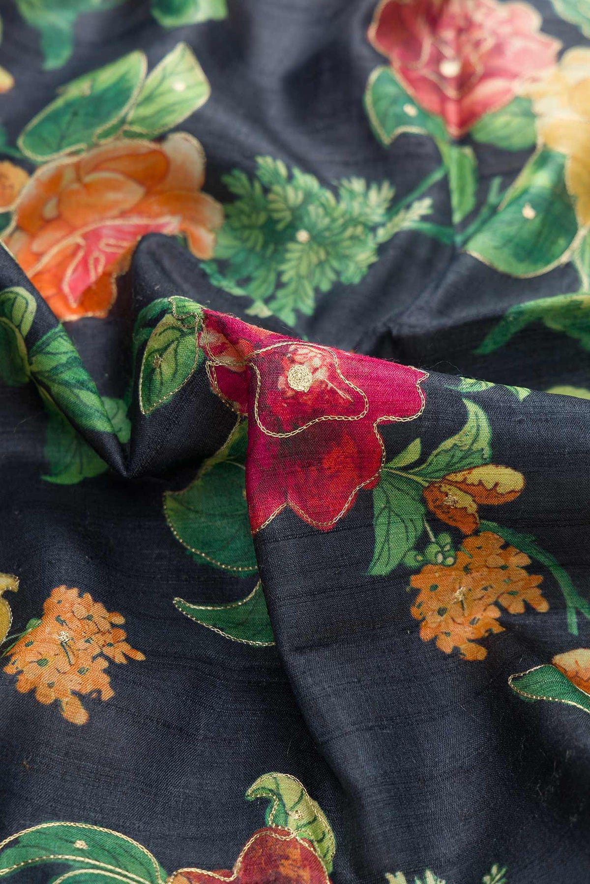 Close up of Navy Blue Dual Tone Tussar Silk Saree with Printed design on the body and Zari Border displaying folds