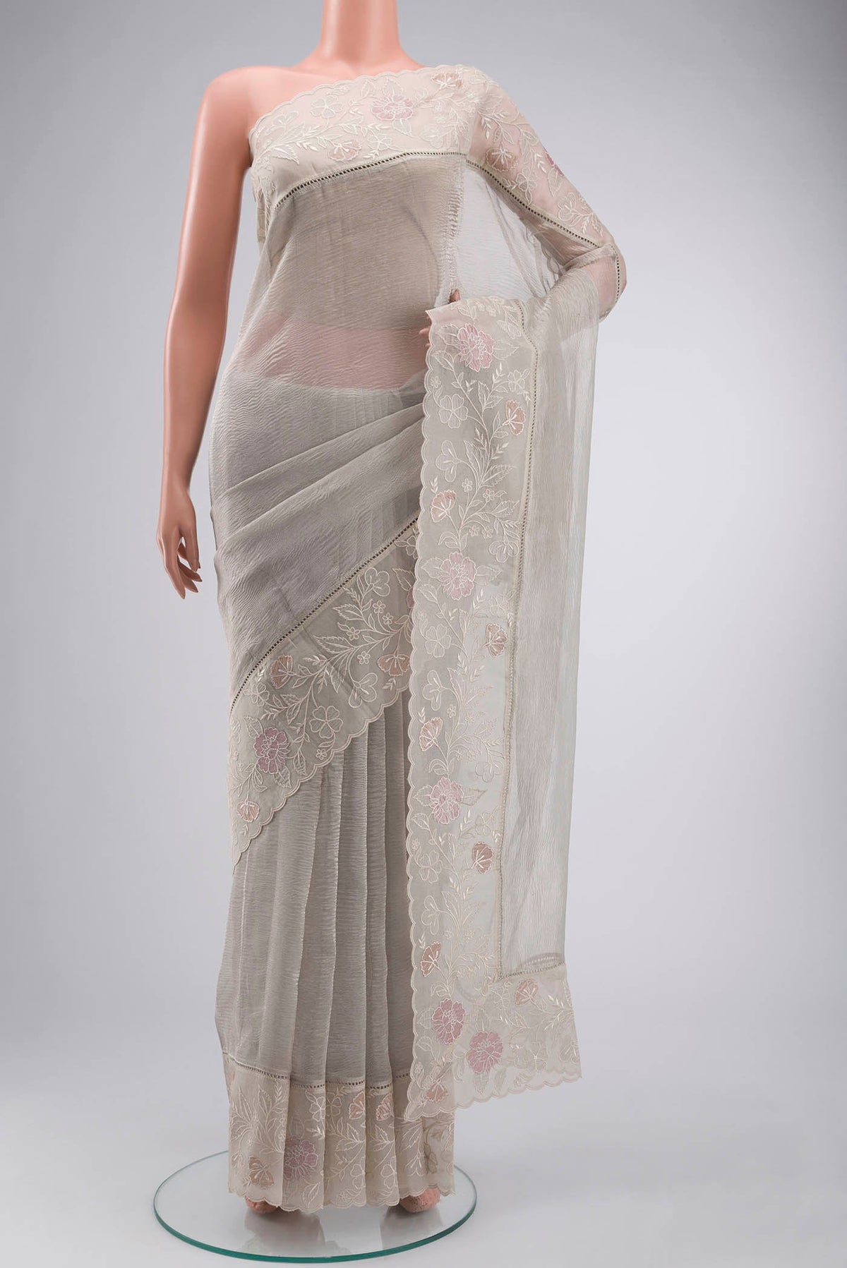 Silver Tissue Silk Saree with Plain Body and Embroidery Border displayed on a mannequin