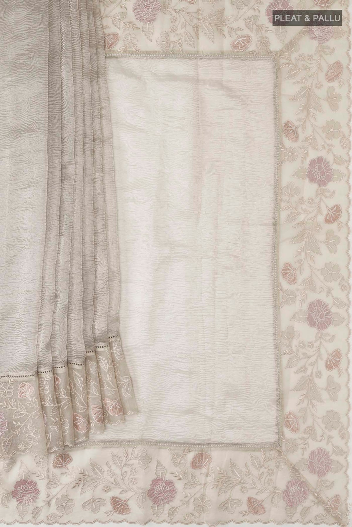 Pleats and pallu of Silver Tissue Silk Saree with Plain Body and Embroidery Border