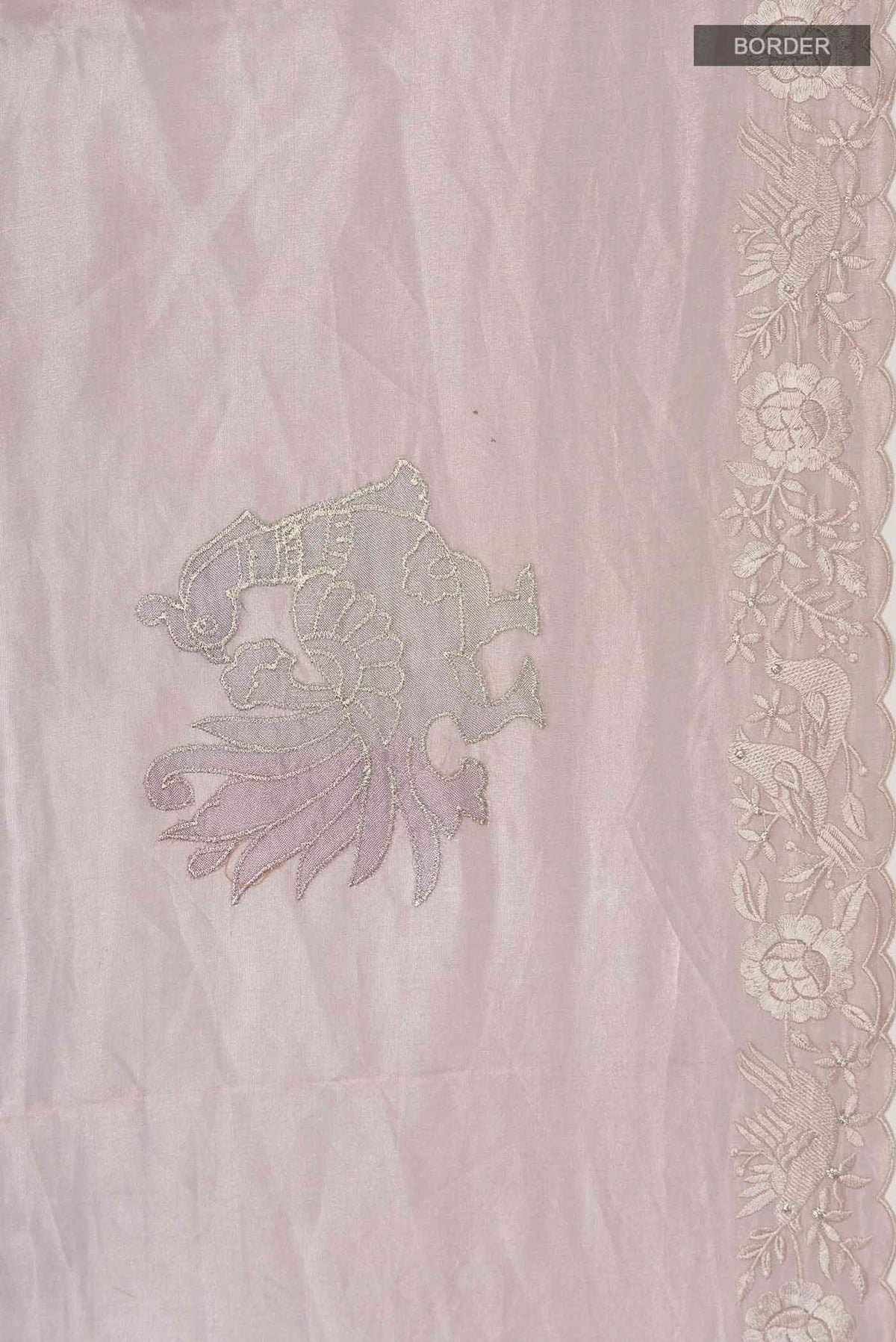 Border image of Lavender Organza Silk Saree with Embroidery on the body and Embroidery Border