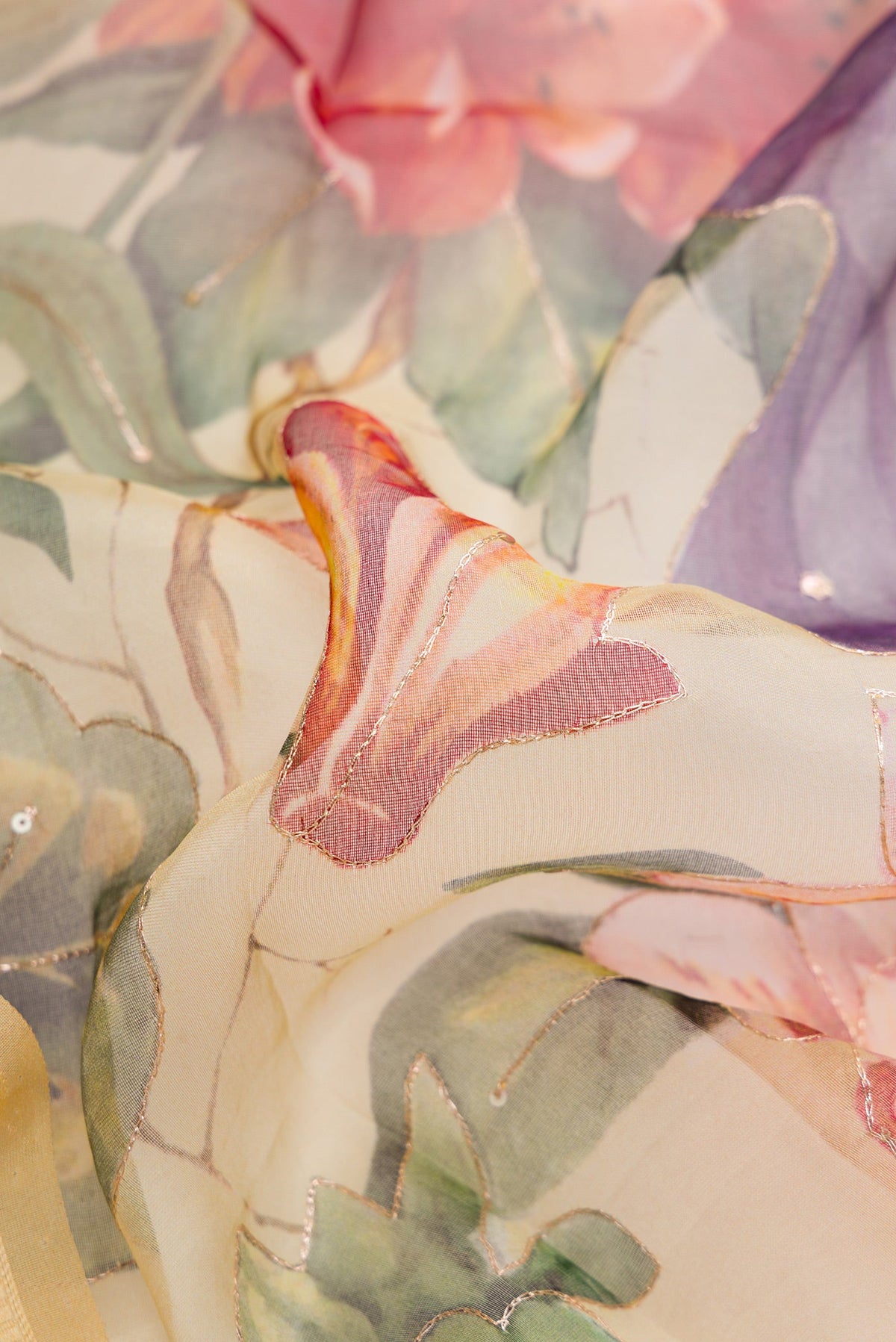 Close up of Sandal Dual Tone Organza Silk Saree with Embroidery on the body and Thread Border.  displaying folds