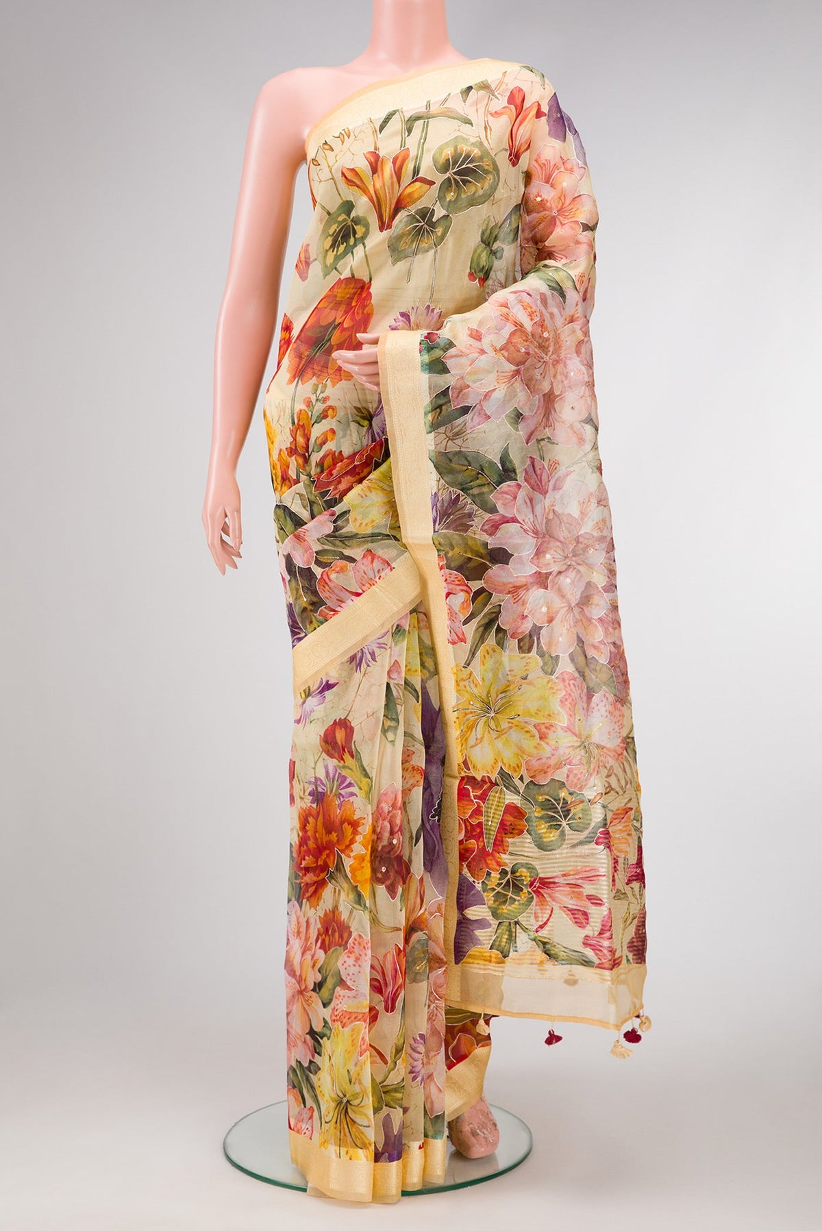 Sandal Dual Tone Organza Silk Saree with Embroidery on the body and Thread Border.  displayed on a mannequin