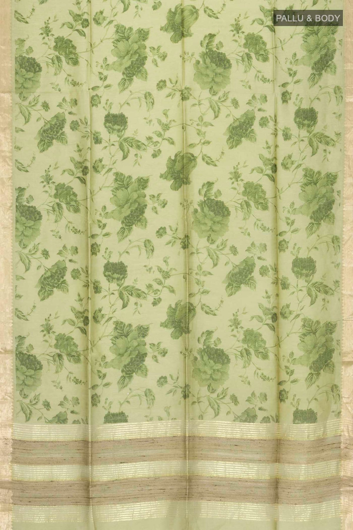 Flat view of Green Tussar Silk Saree with Printed design on the body and Zari Border