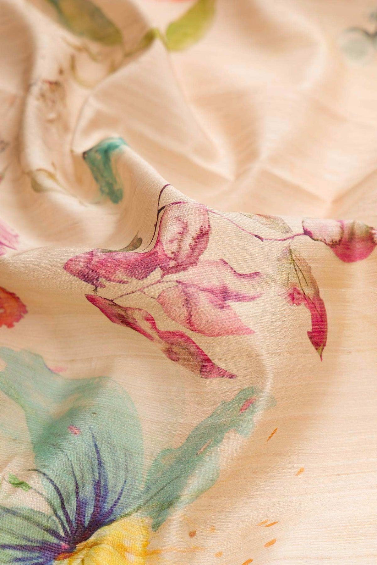 Close up of Dark Beige Dual Tone Tussar Silk Saree with Printed design on the body and Thread Border displaying folds