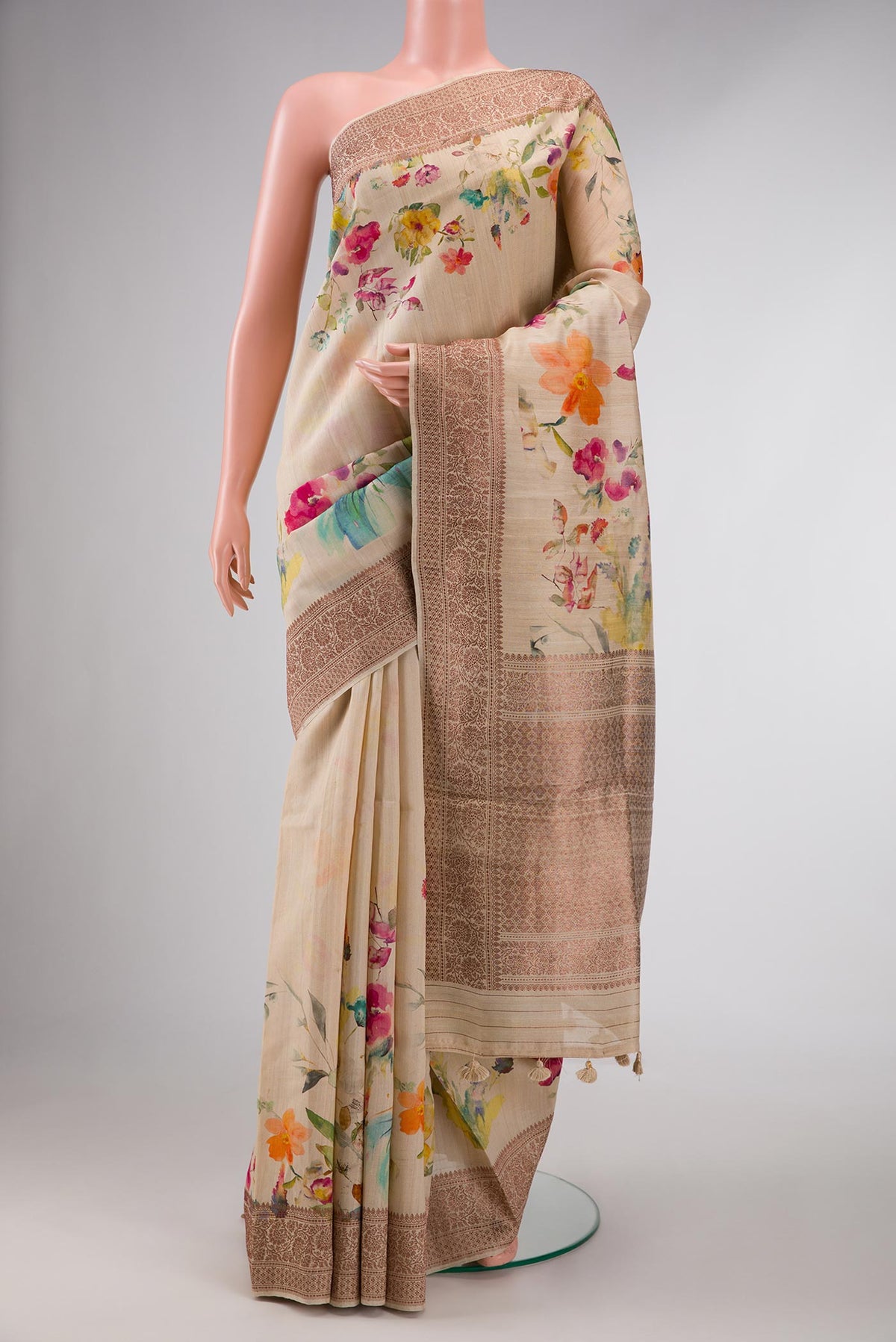 Dark Beige Dual Tone Tussar Silk Saree with Printed design on the body and Thread Border displayed on a mannequin