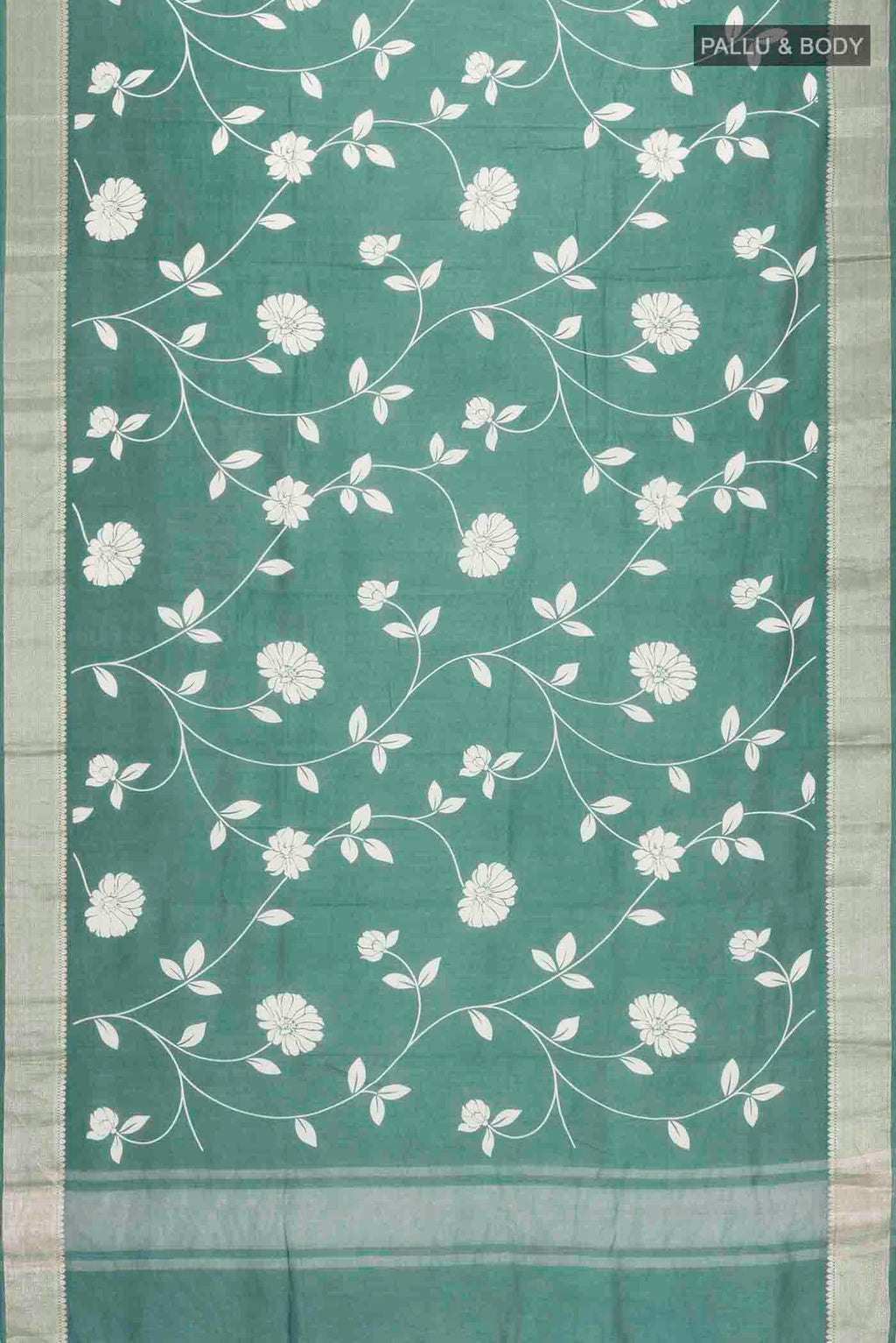 Flat view of Green Tussar Silk Saree with Printed design on the body and Zari Border