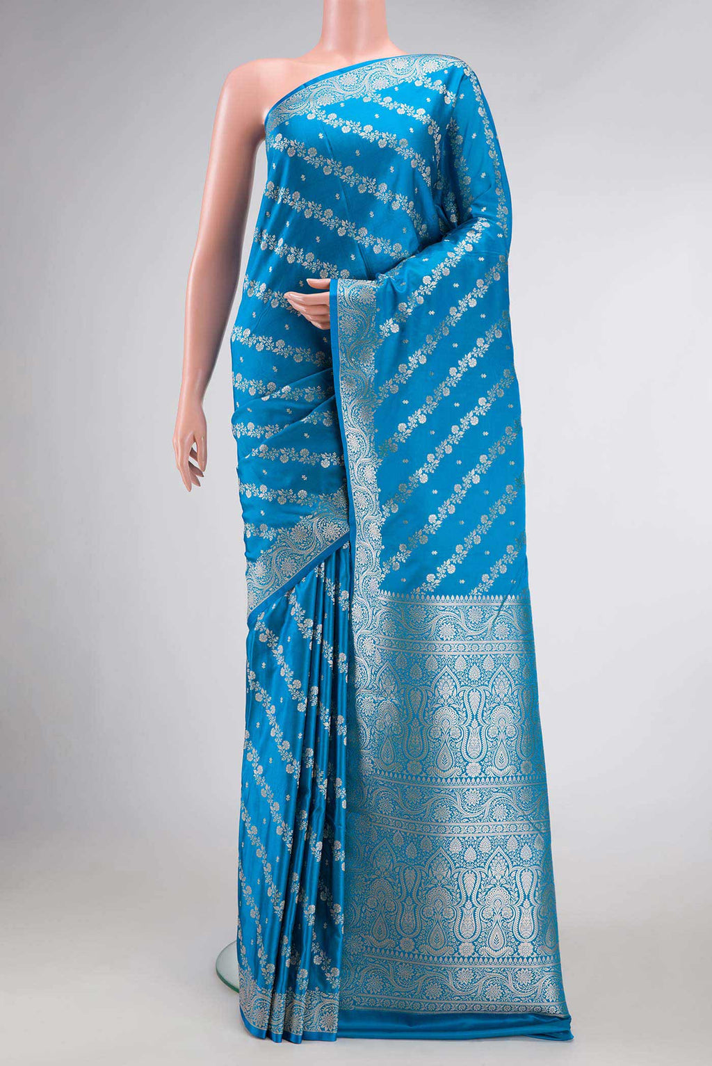 Sky Blue Dual Tone Blended Banarasi Silk Saree with Zari Brocade on the body and Zari Border.  displayed on a mannequin