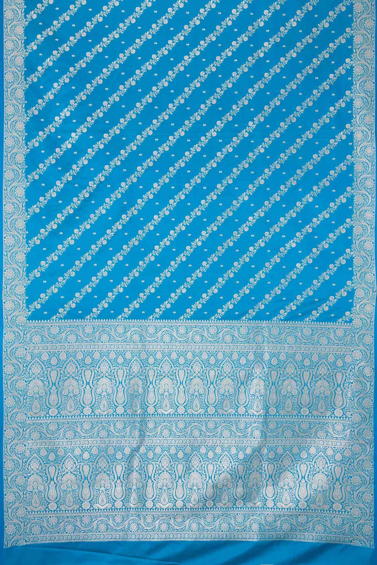 Flat view of Sky Blue Dual Tone Blended Banarasi Silk Saree with Zari Brocade on the body and Zari Border. 