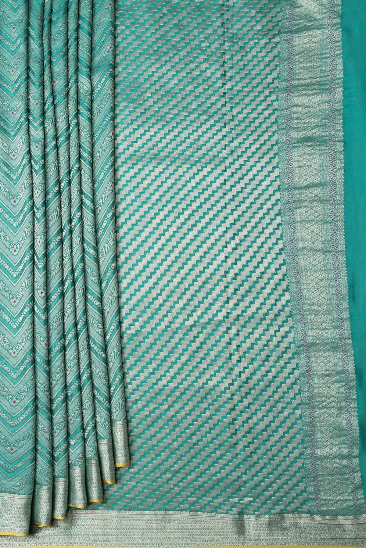 Pleats and pallu of Sea Green Dual Tone Tussar Silk Saree with Zari Brocade on the body and Zari Border. 
