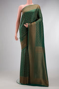 Bottle Green Dual Tone Mysore Crepe Saree with Zari Brocade on the body and Zari Border.  displayed on a mannequin
