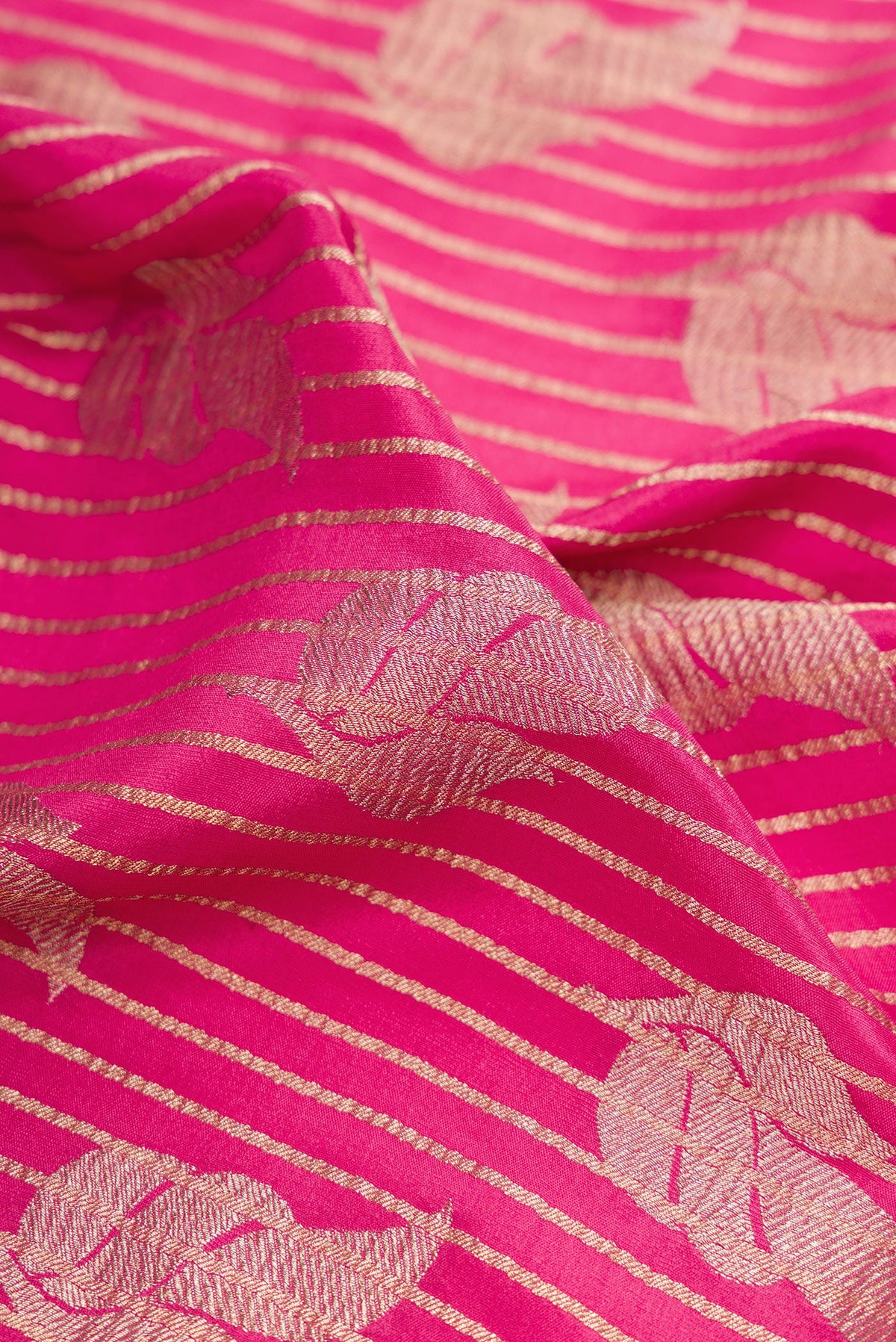 Close up of Pink Mysore Crepe Saree with Stripes on the body and Zari Border.  displaying folds
