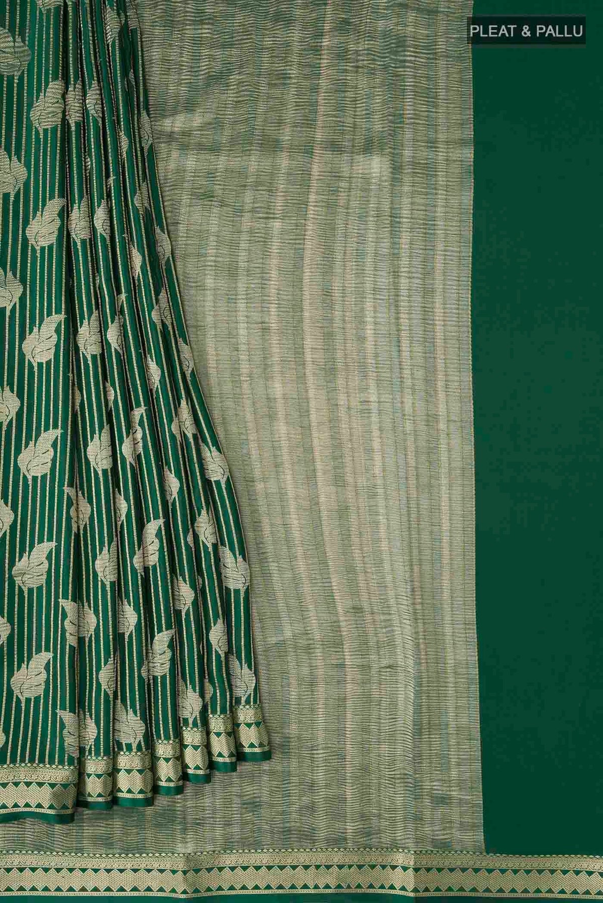 Pleats and pallu of Green Mysore Crepe Saree with Zari Butta on the body and Zari Border