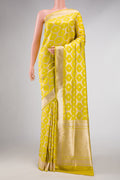 Yellow Dual Tone Banarasi Silk Saree with Zari Brocade on the body and Zari Border displayed on a mannequin
