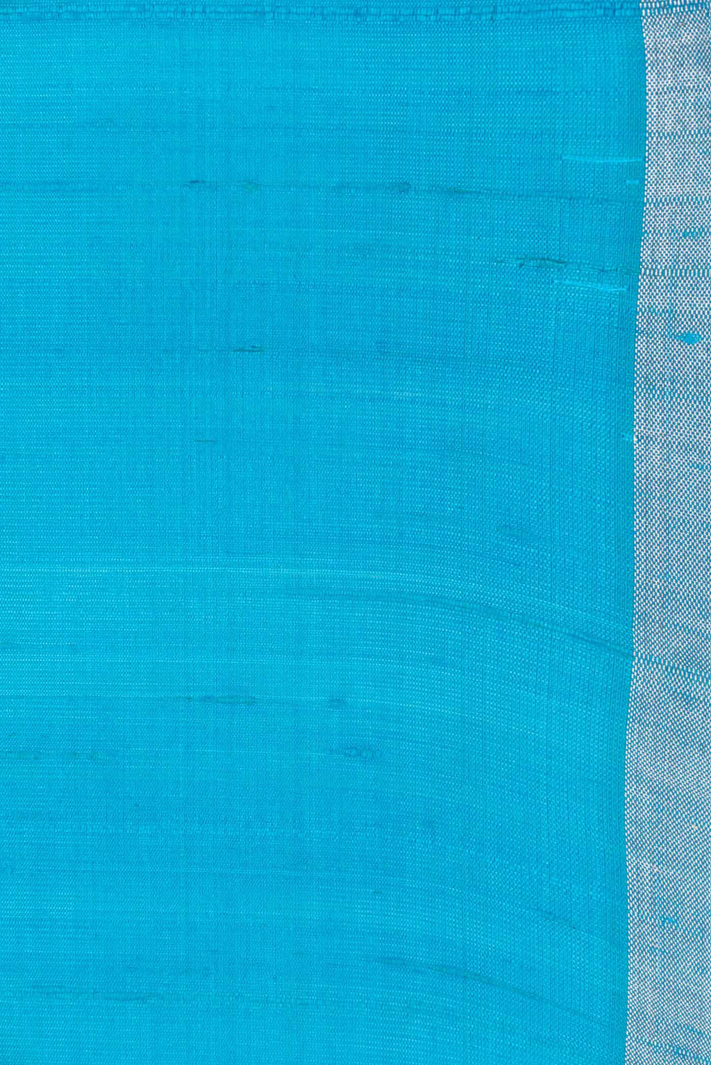 Border image of Sky Blue Dual Tone Raw Silk Saree with Plain Body and Zari Border