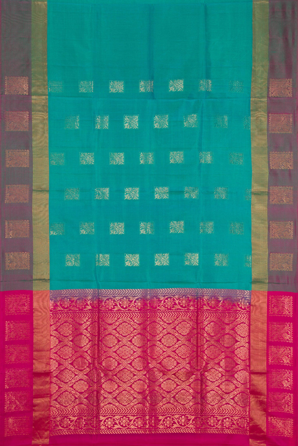 Flat view of Peacock Blue Dual Tone Soft Silk Saree with Zari Butta on the body and Fancy Border. 