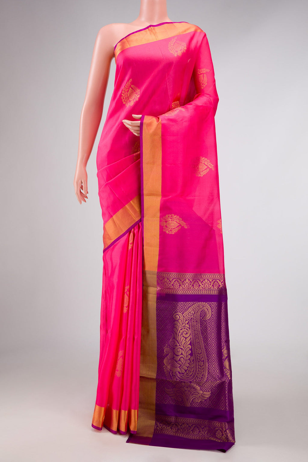 Pink Dual Tone Soft Silk Saree with Zari Butta on the body and Zari Border displayed on a mannequin