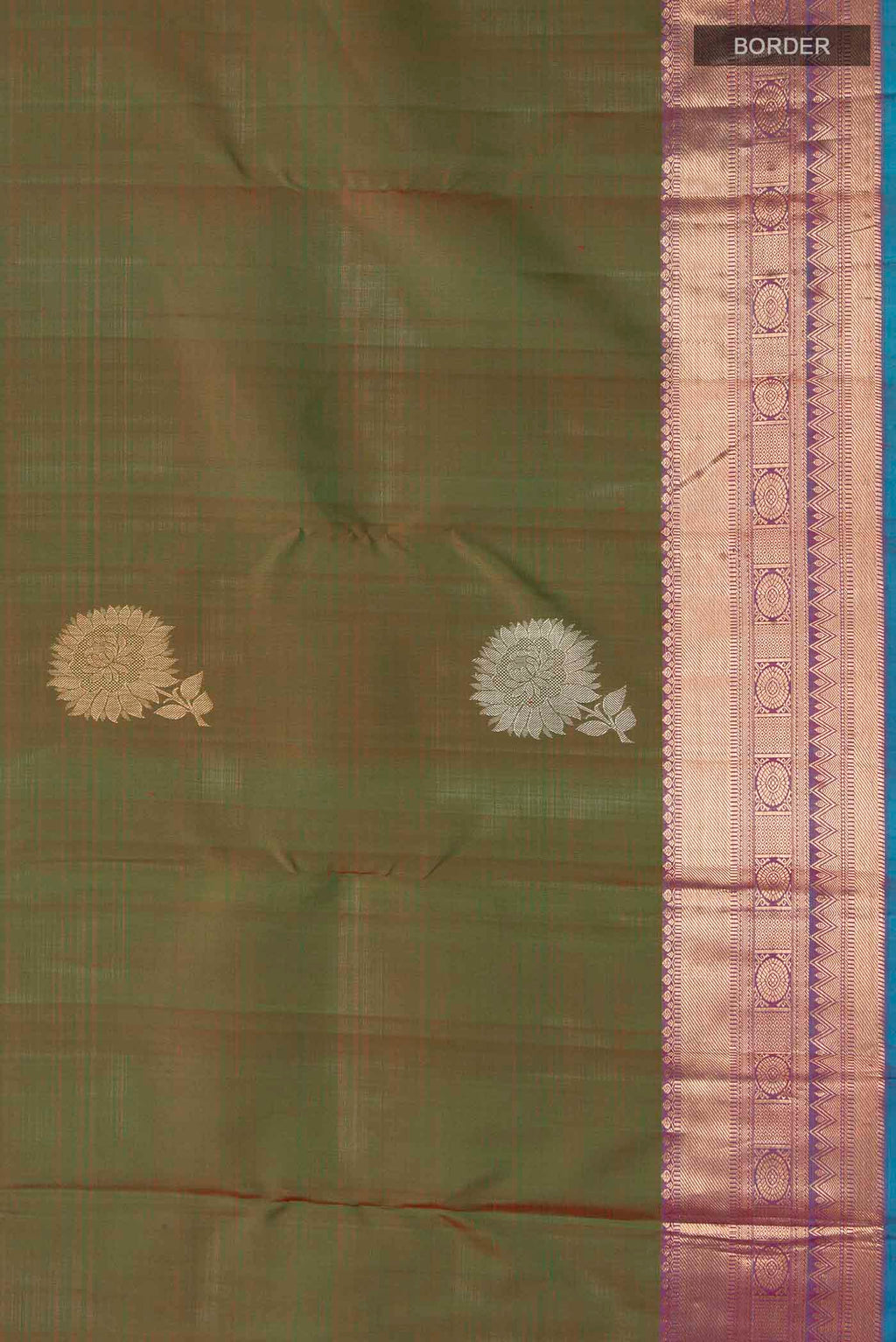 Border image of Green Kanchipuram Silk Saree with Zari Butta on the body and Zari Border