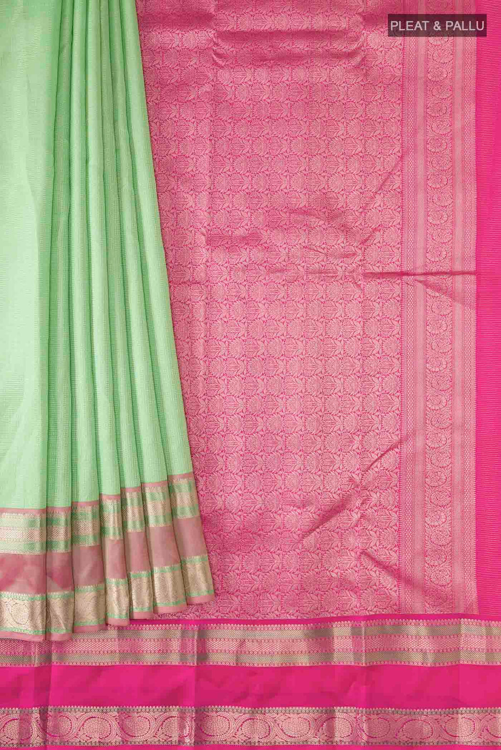 Pleats and pallu of Green Kanchipuram Silk Saree with Checked design on the body and Zari Border