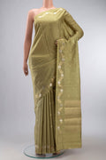 Green Banarasi Raw Silk Saree with Zari Butta on the body and Zari Border displayed on a mannequin