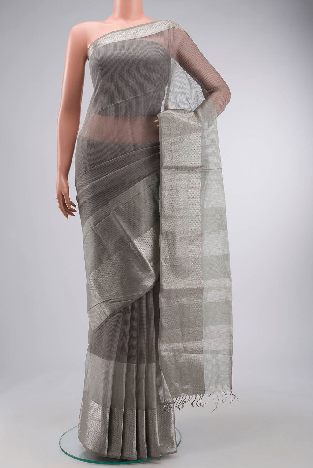 Grey Maheshwari Silk Saree with Stripes on the body and Zari Border displayed on a mannequin