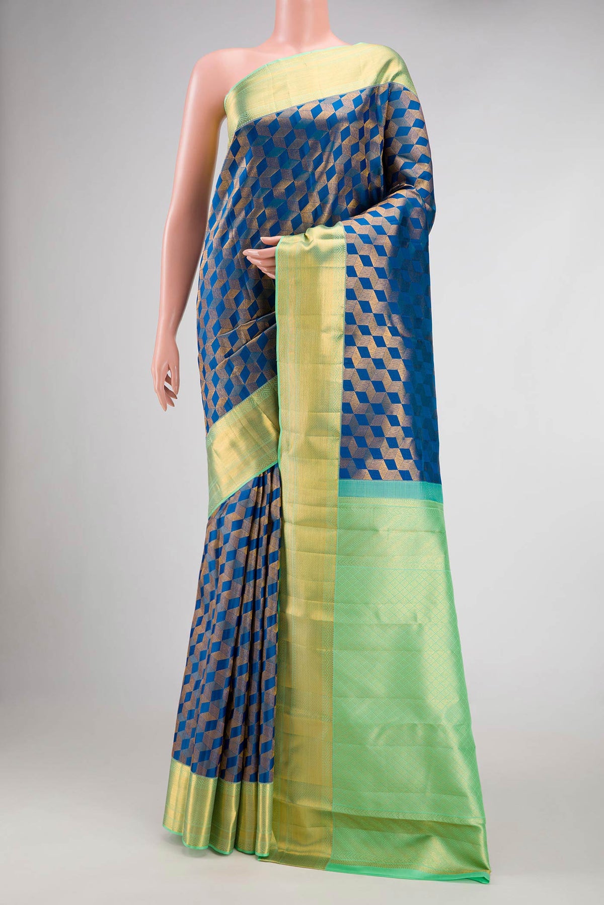Peacock Blue Dual Tone Kanchipuram Silk Saree with Zari Brocade on the body and Zari Border.  displayed on a mannequin