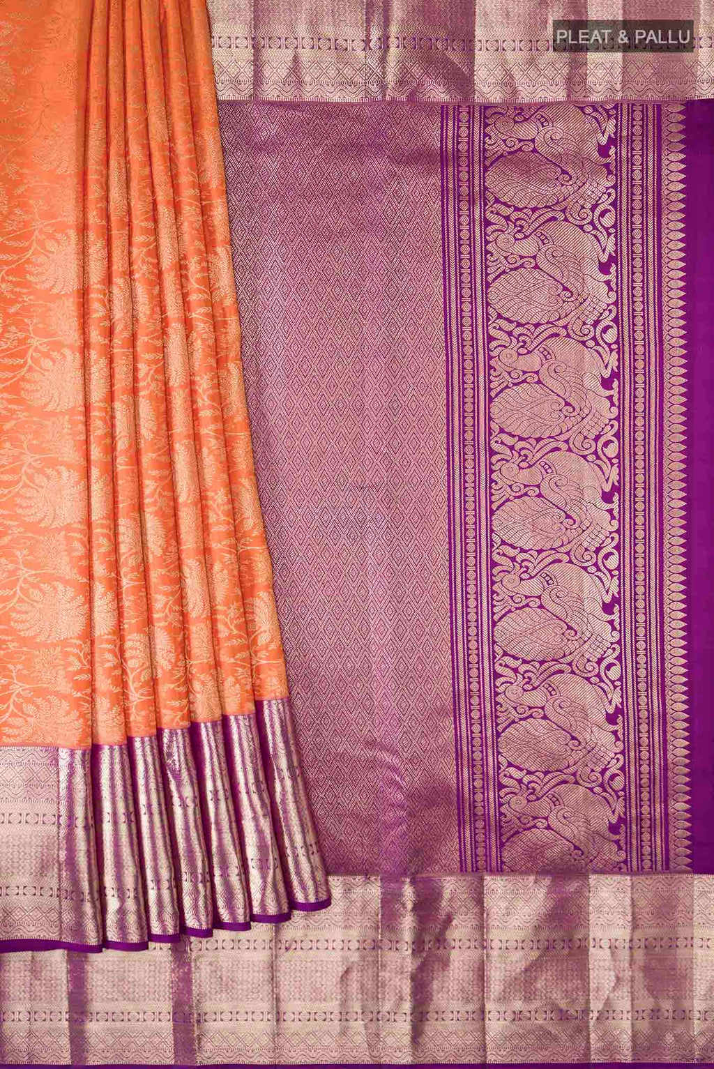 Pleats and pallu of Orange Kanchipuram Silk Saree with Zari Brocade on the body and Zari Border
