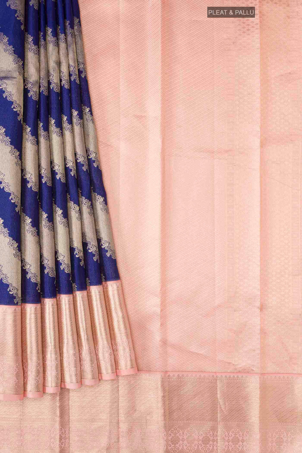 Pleats and pallu of Blue Kanchipuram Silk Saree with Zari Butta on the body and Zari Border