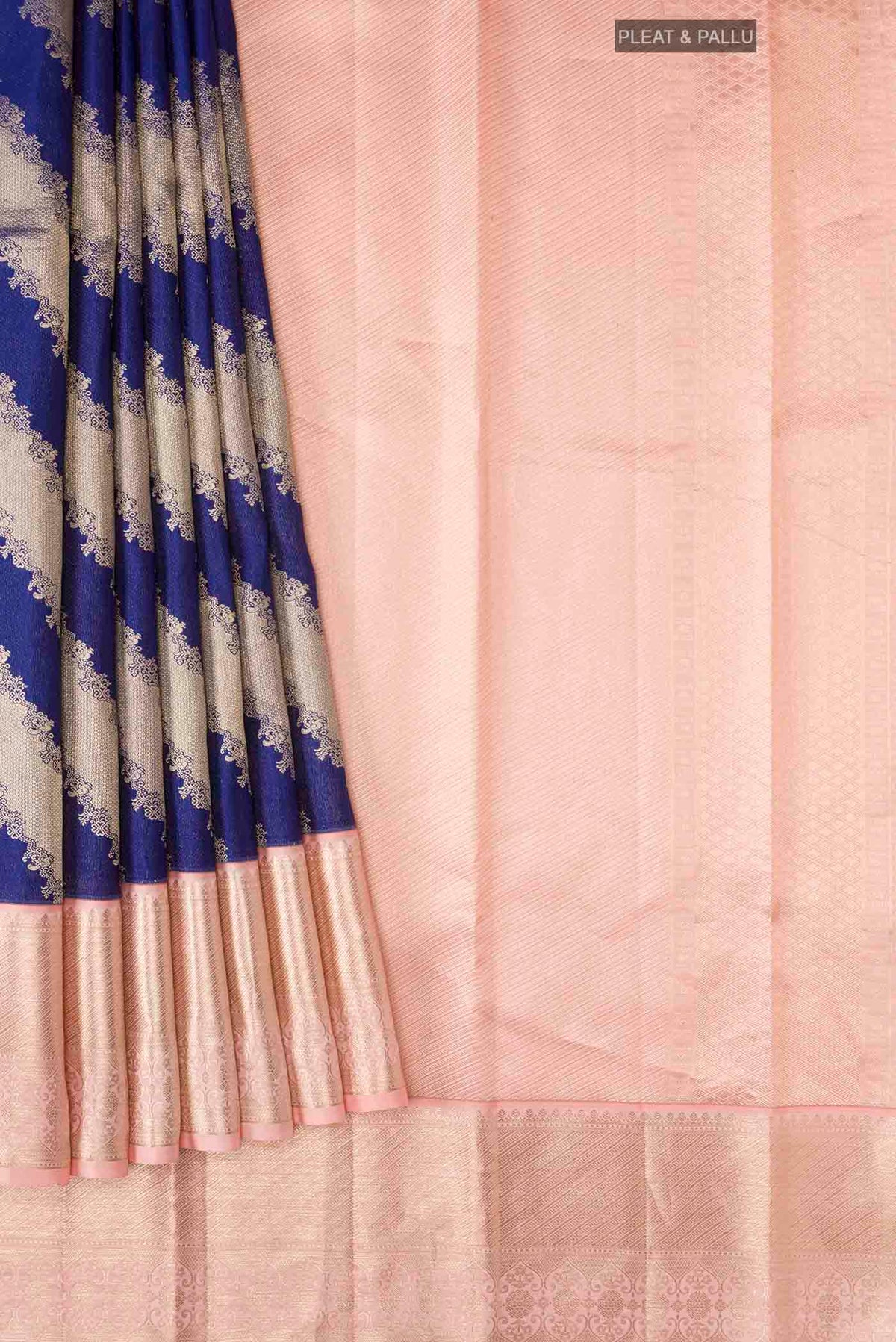 Pleats and pallu of Blue Kanchipuram Silk Saree with Zari Butta on the body and Zari Border