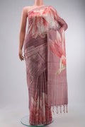 Mauve Tussar Silk Saree with Embroidery on the body and Zari Border displayed on a mannequin