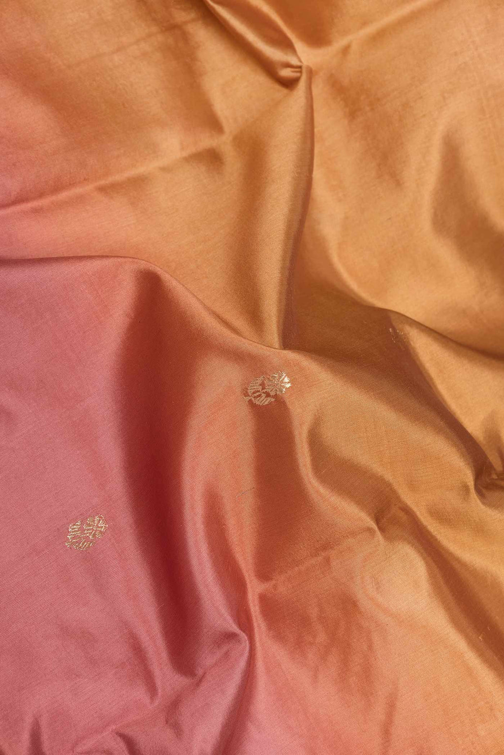 Close up of Multi Color Tussar Saree with Zari Butta on the body and Fancy Border displaying folds