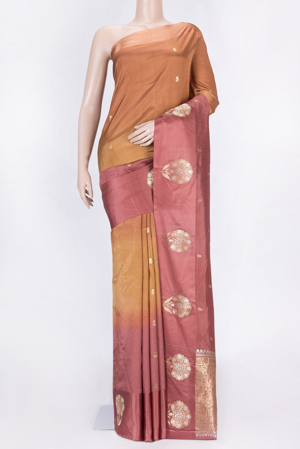Multi Color Tussar Saree with Zari Butta on the body and Fancy Border displayed on a mannequin